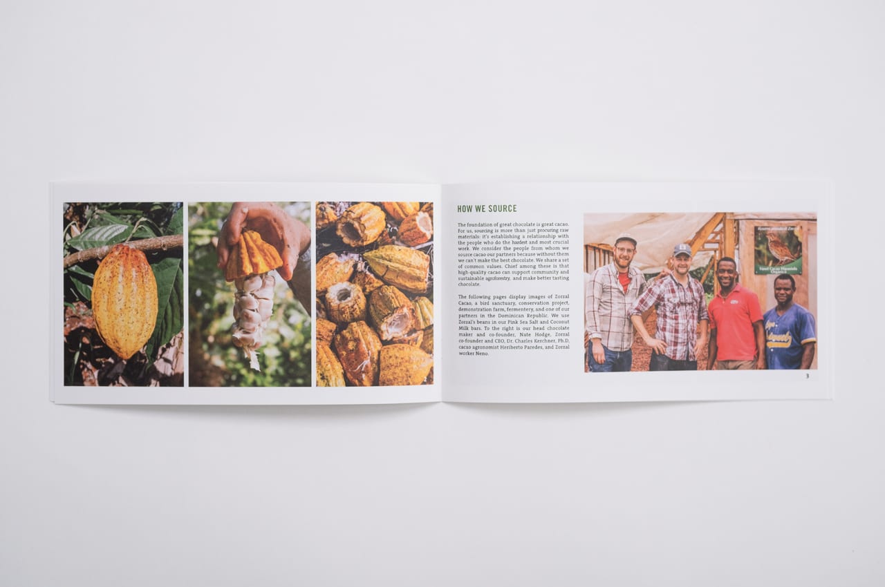A marketing booklet laying open to images of chocolate and coffee beans being harvested and details about the process.