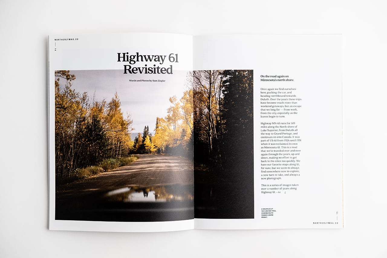 A custom travel booklet laying open and printed with Highway 61 Revisited at the top.