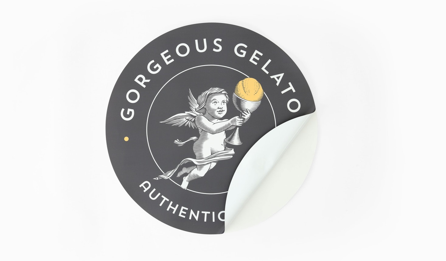 A custom vinyl wall decal printed with a round design and Gorgeous Gelato Authentic.