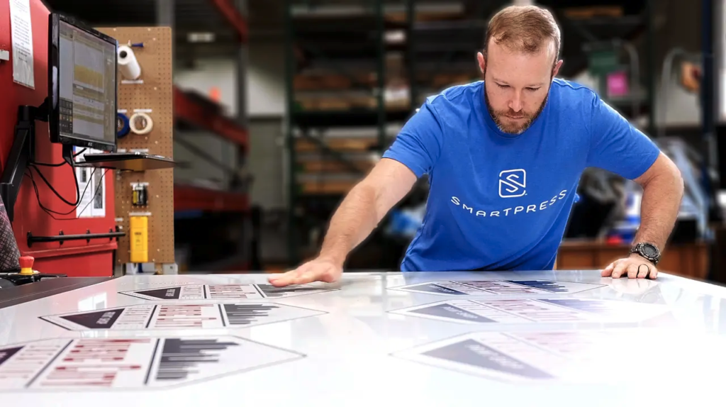 Man in Smartpress T-shirt ensures printing satisfaction guarantee